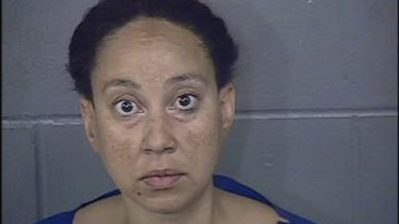 Police say Melanie Biggins shot her husband in bed before blaming a possible home intruder.