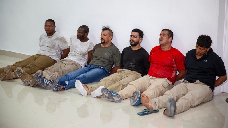 FILE - Suspects in the assassination of Haiti's President Jovenel Moise, among them...