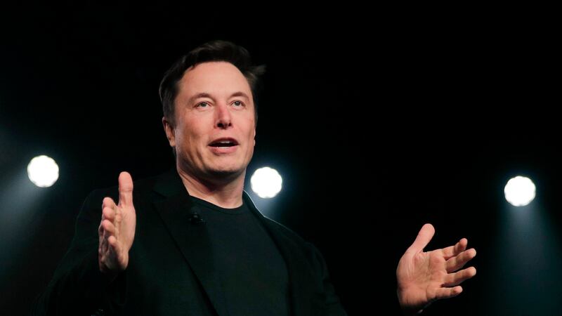 FILE - The billionaire Tesla CEO has proposed to buy the company at the originally agreed-on...